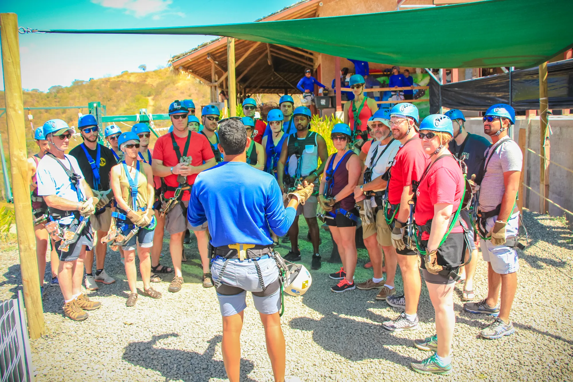 A group of visitors getting a safety lesson