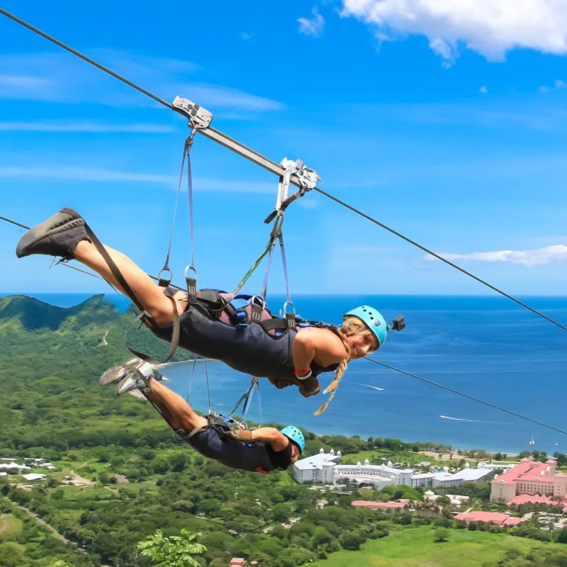 two people on a zipline